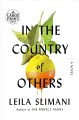 In the country of others : volume one war, war, war : a novel  Cover Image